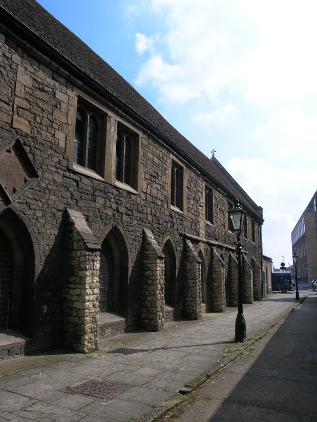 Exterior view of Greyfriars building showing buttresses and windows.